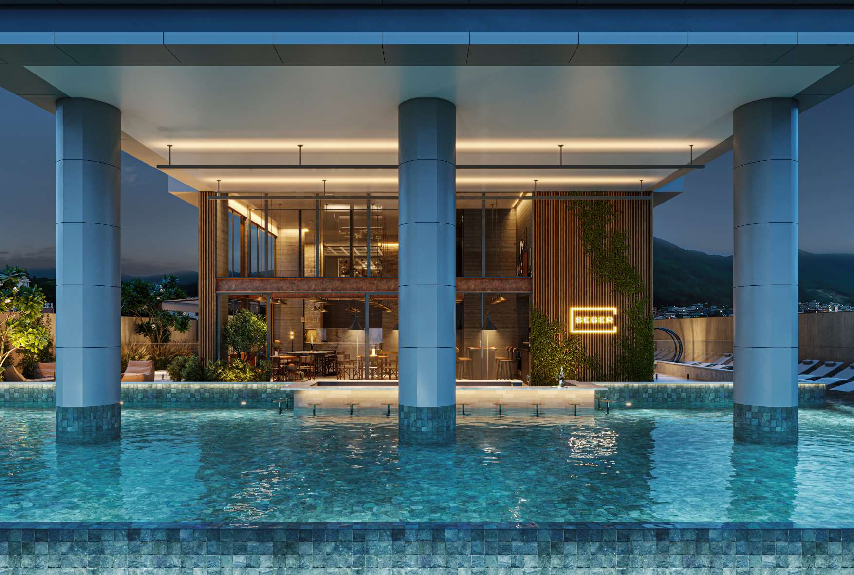Piscina borda infinita noturna com letreiro Seger